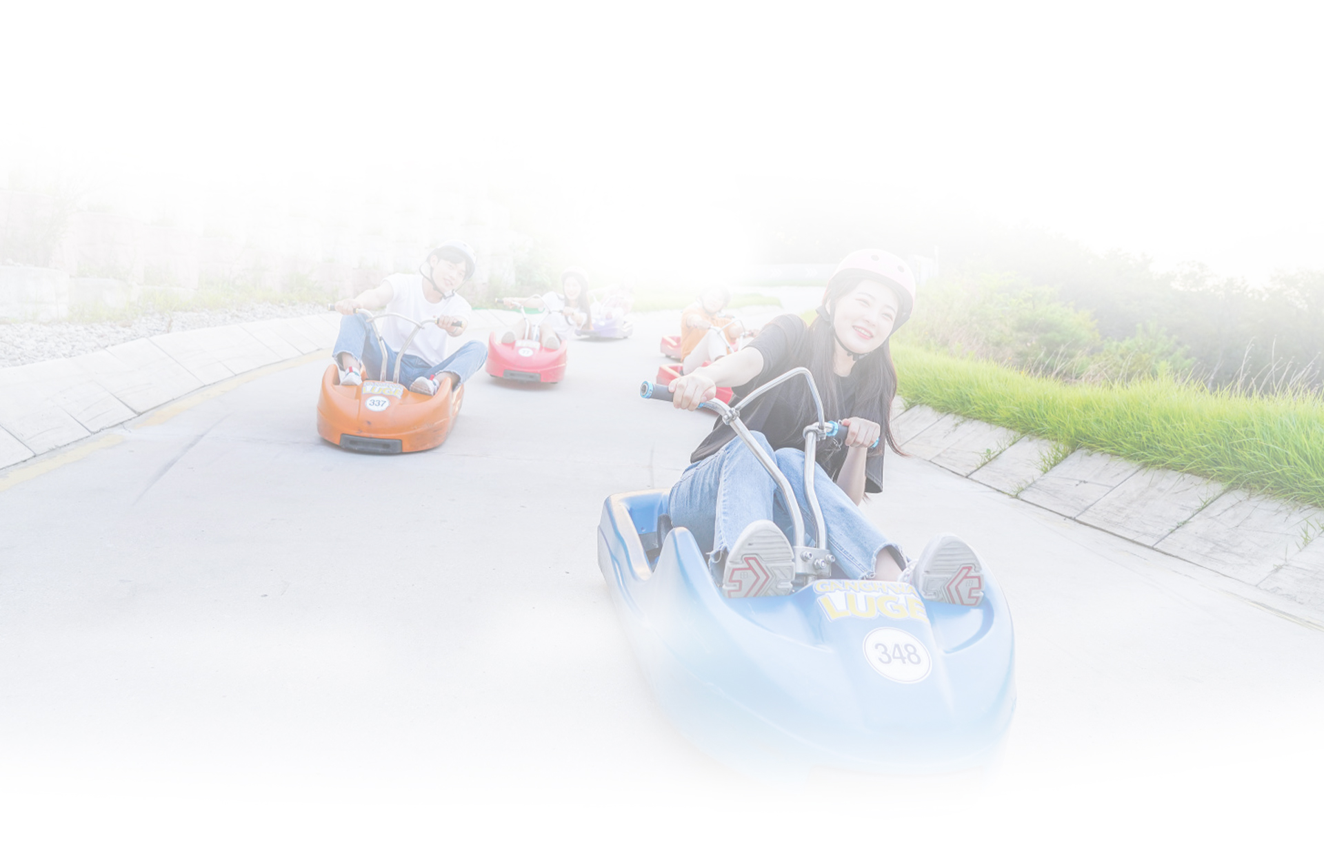 Riders on the Ganghwa Luge course